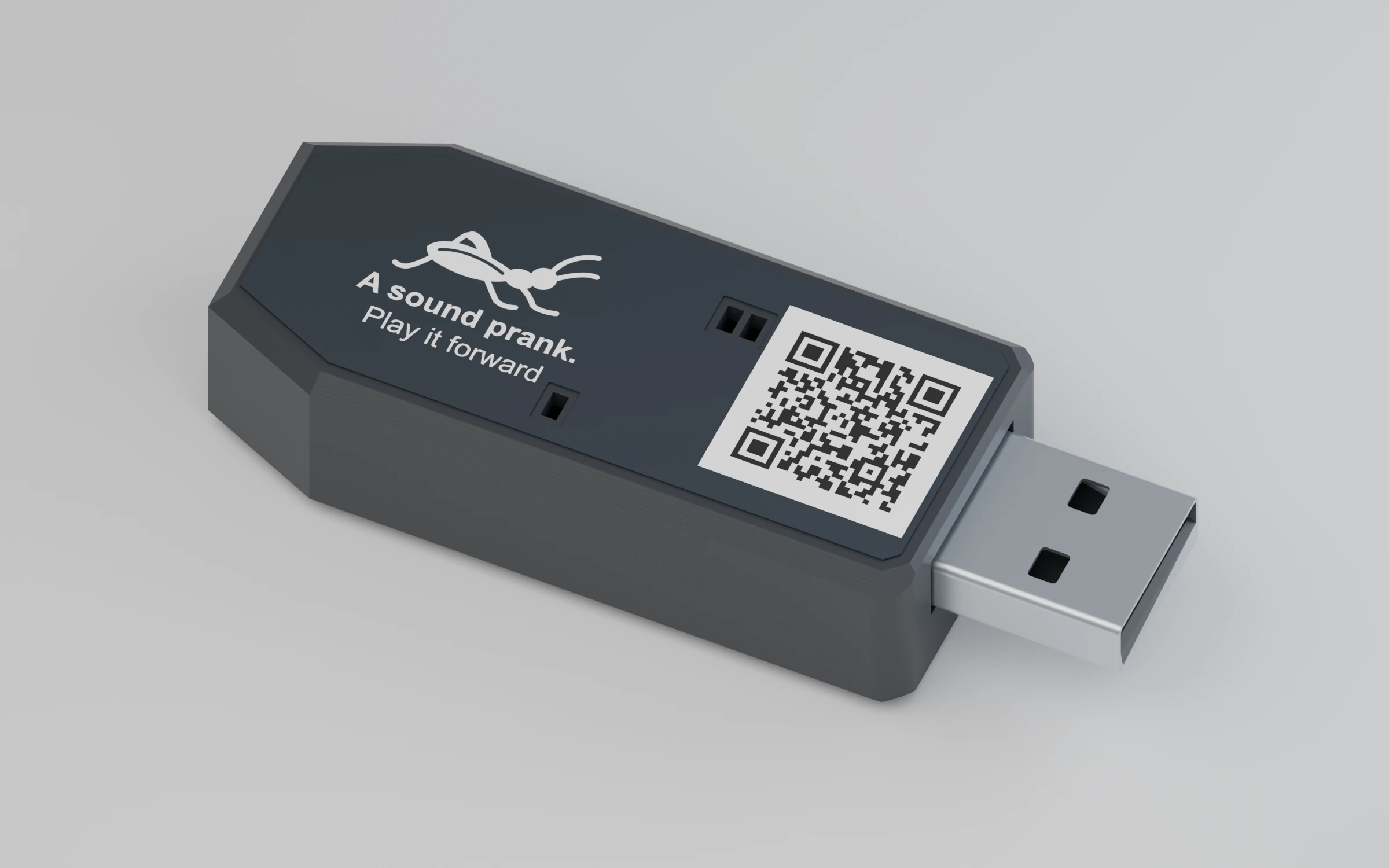 Cricket 008 USB-A sound prank device with a charcoal enclosure, cricket label, LED windows and instructions QR